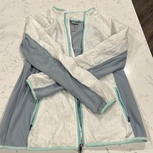 White and grey Champion Jacket.